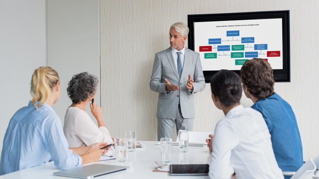 Business Consultants doing a powerpoint presentation